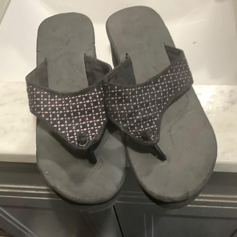 Black flip flops